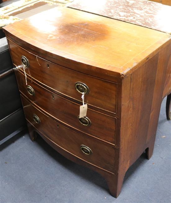 A Regency mahogany bowfronted chest of three long drawers W.74cm